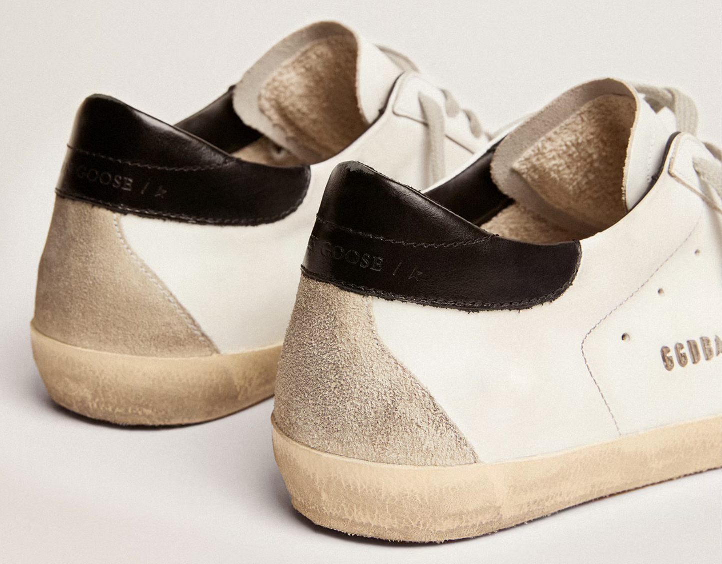 Golden Goose Super-Star with black heel tab and metal stud lettering