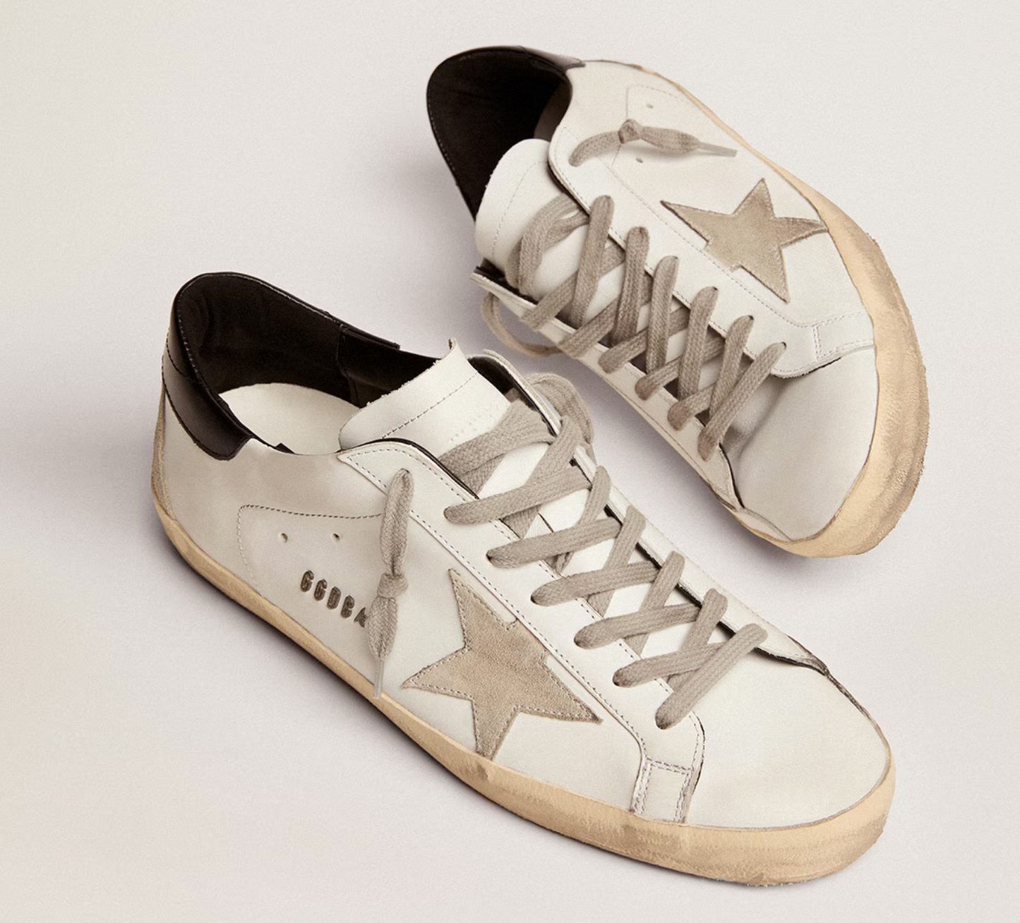 Golden Goose Super-Star with black heel tab and metal stud lettering