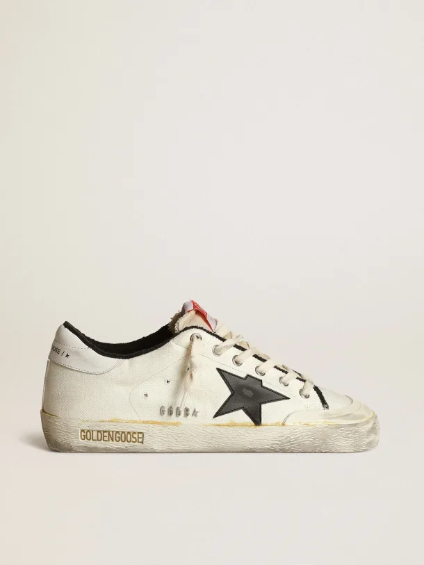 Golden Goose Super-Star beige canvas with black leather star and white leather heel tab