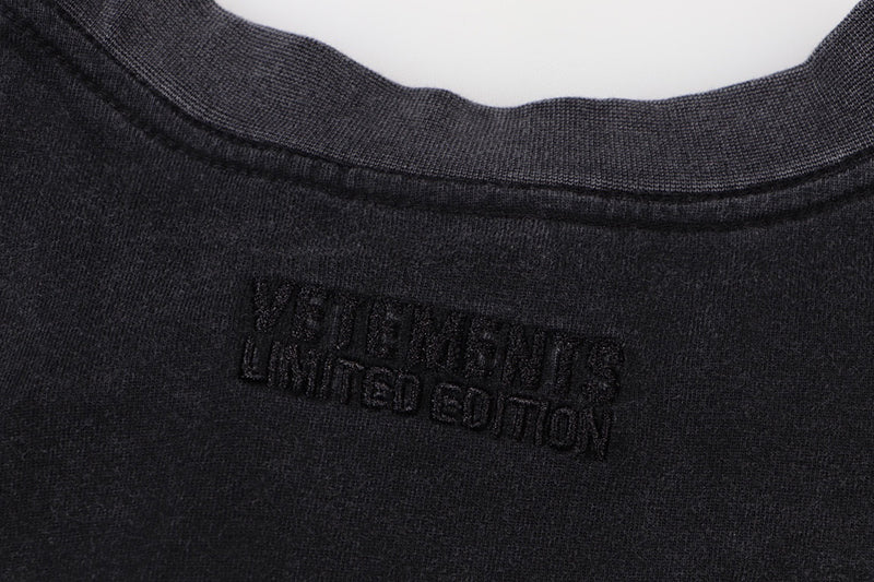VETEMENTS logo-print Cotton T-shirt | Black