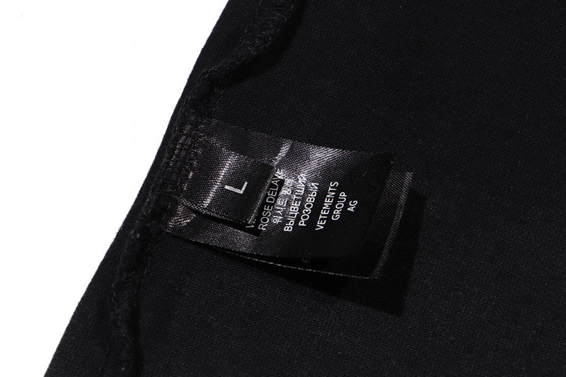 VETEMENTS Spring Water T-shirt | Black