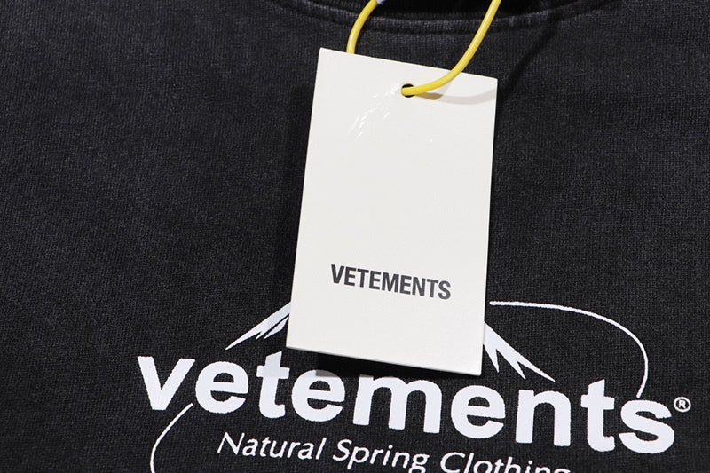 VETEMENTS Spring Water T-shirt | Black