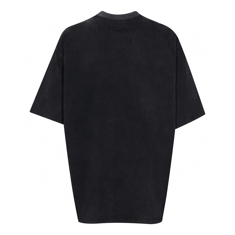 VETEMENTS logo-print Cotton T-shirt | Black