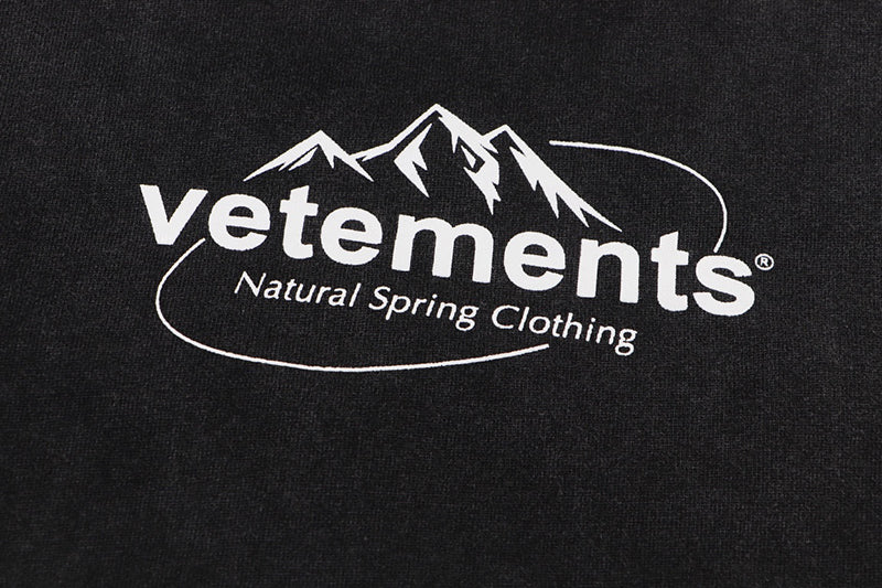 VETEMENTS Spring Water T-shirt | Black