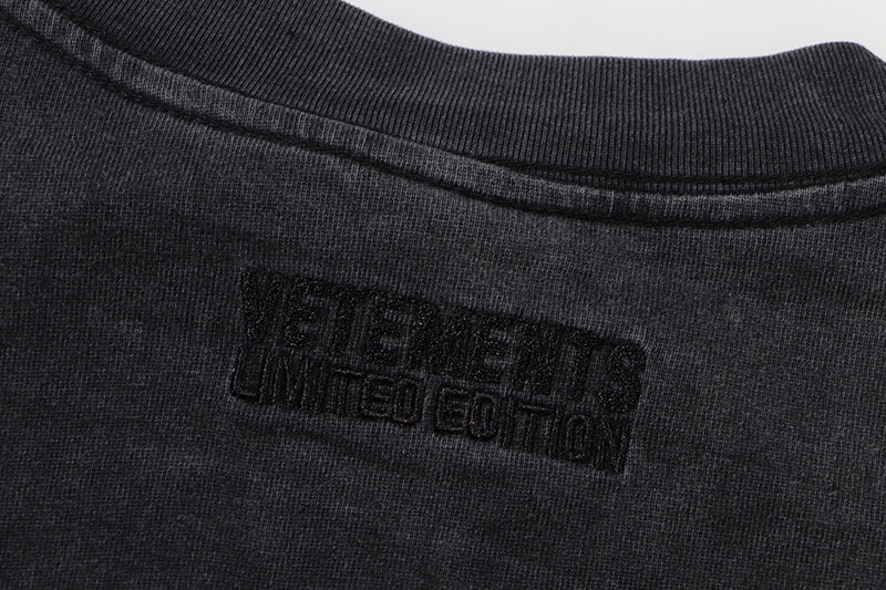 VETEMENTS Spring Water T-shirt | Black