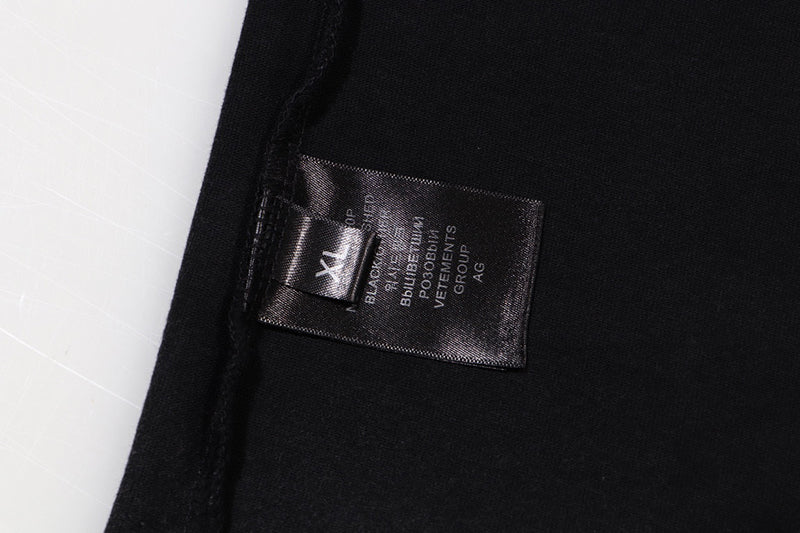 VETEMENTS logo-print Cotton T-shirt | Black