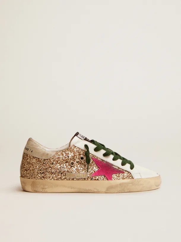 Golden Goose Super-Star gold glitter with fluorescent pink suede star