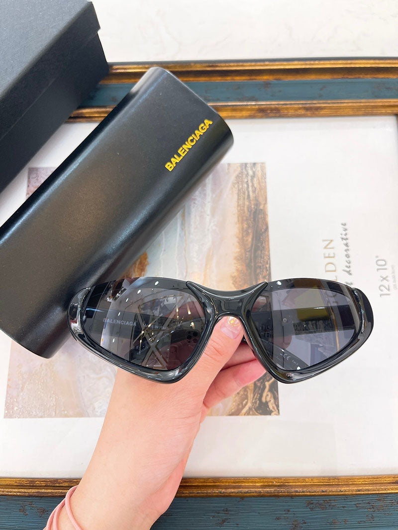 Balenciaga Xpander BB0202s-001 wrap around black sunglasses